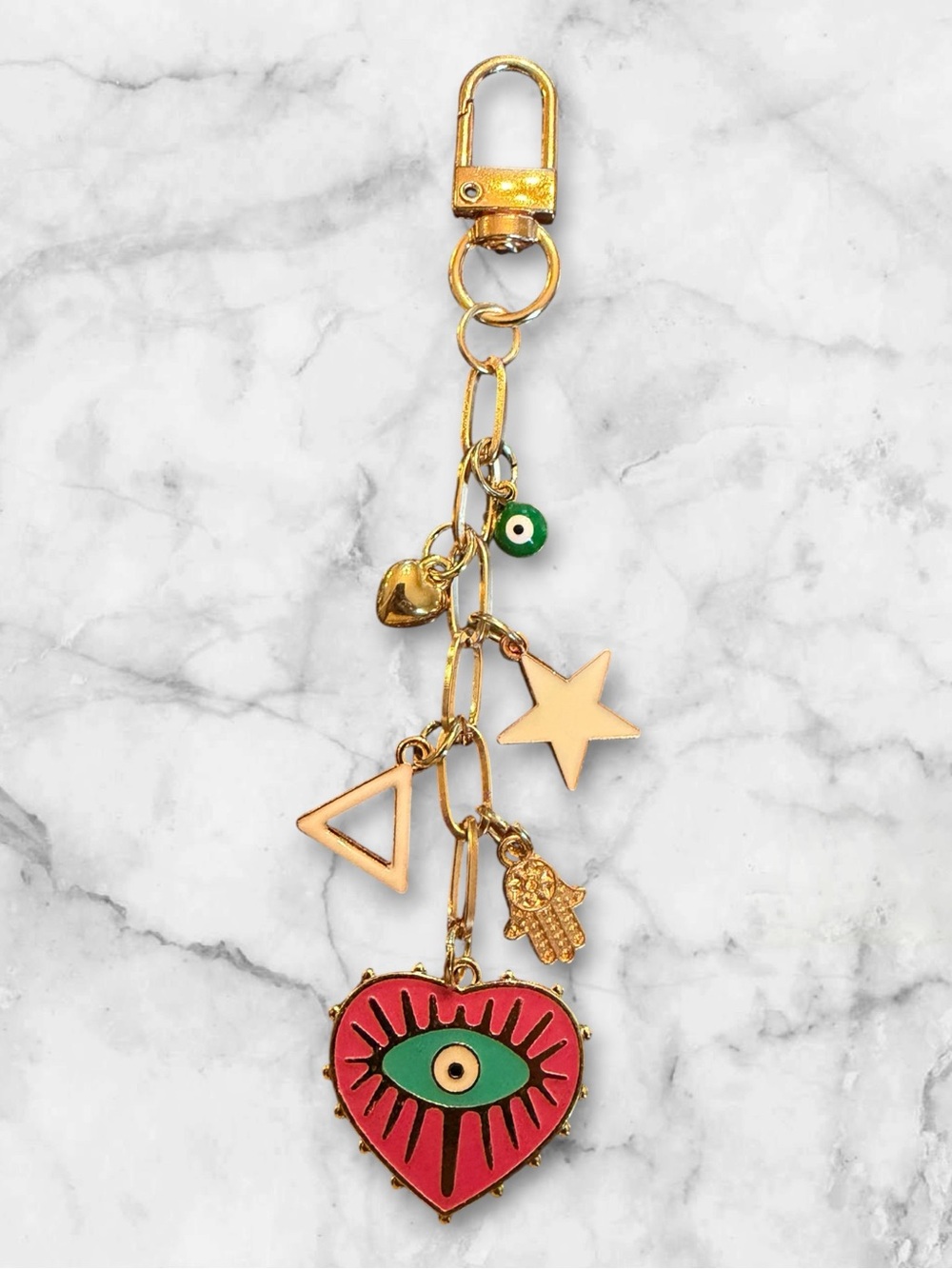 Gold Tone Heart Eye Charm Keychain with pink & Teal Enamel